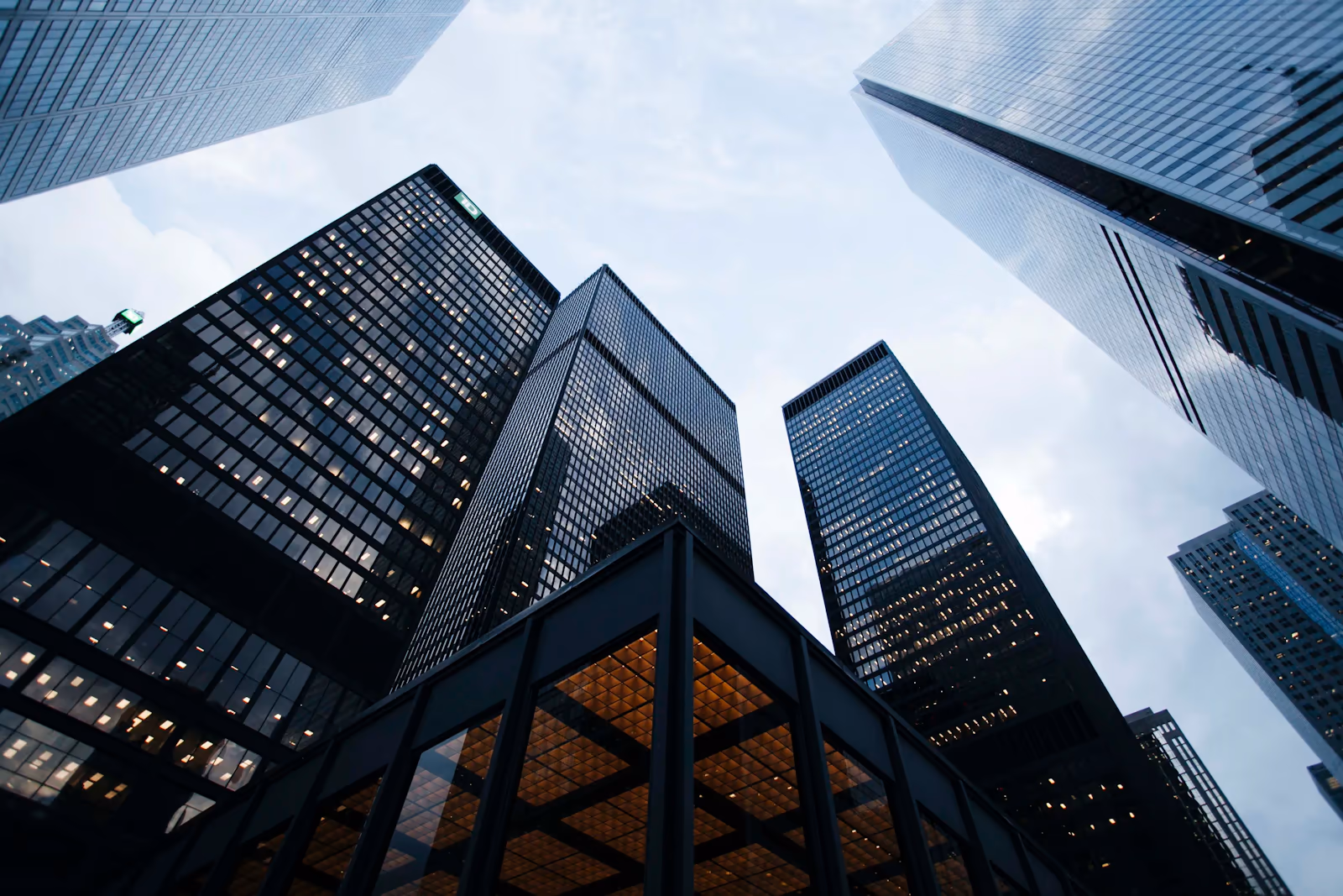 Office towers at nightfall, floors still lit